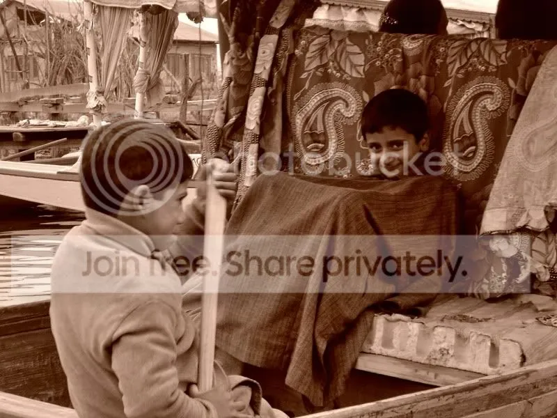 Kashmiri Boy in a Shikara